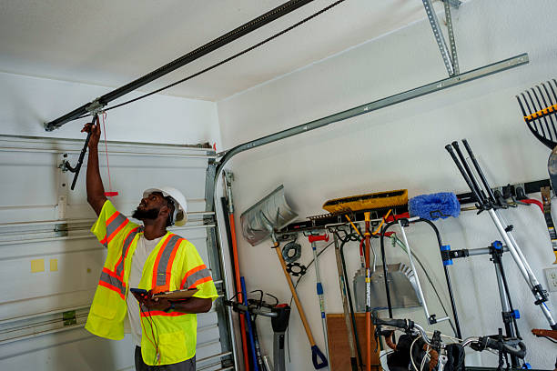 Professional Garage Door Panel Replacement technician working in Lee Acres, NM